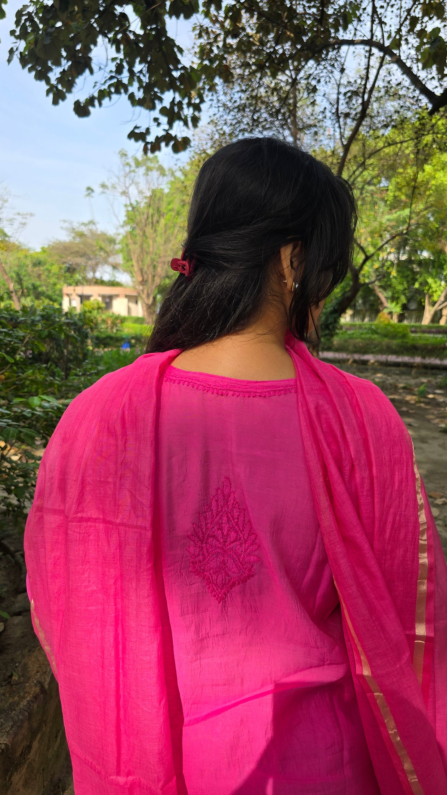 Handmade suit set of magenta colour with buta on back of kurti