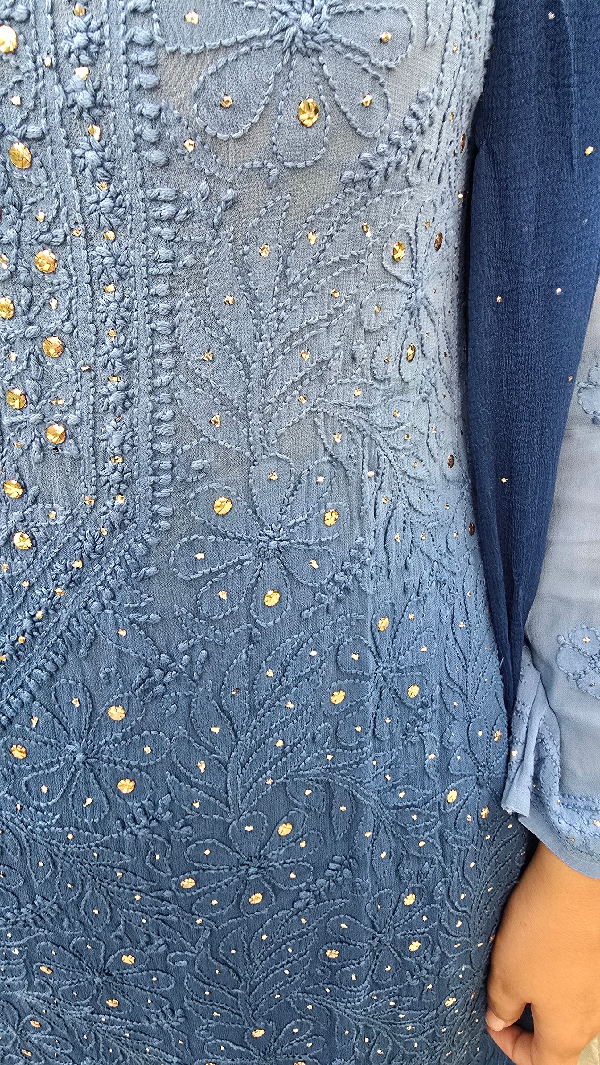 Close-up of a blue floral pattern chikankari with mukesh