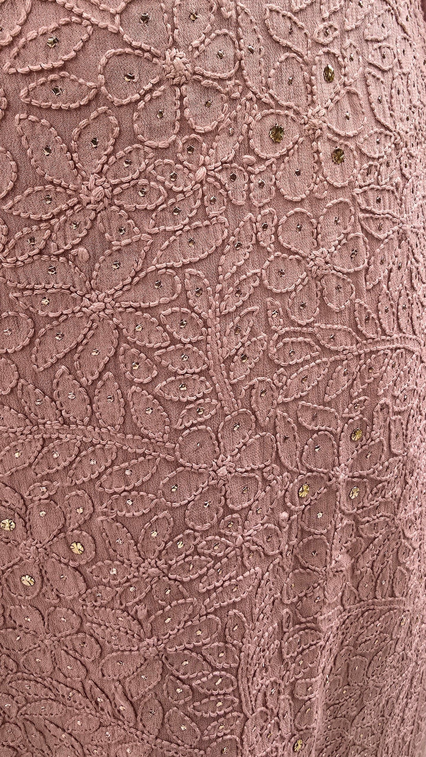 Close-up of floral patterns chikankari with mukesh