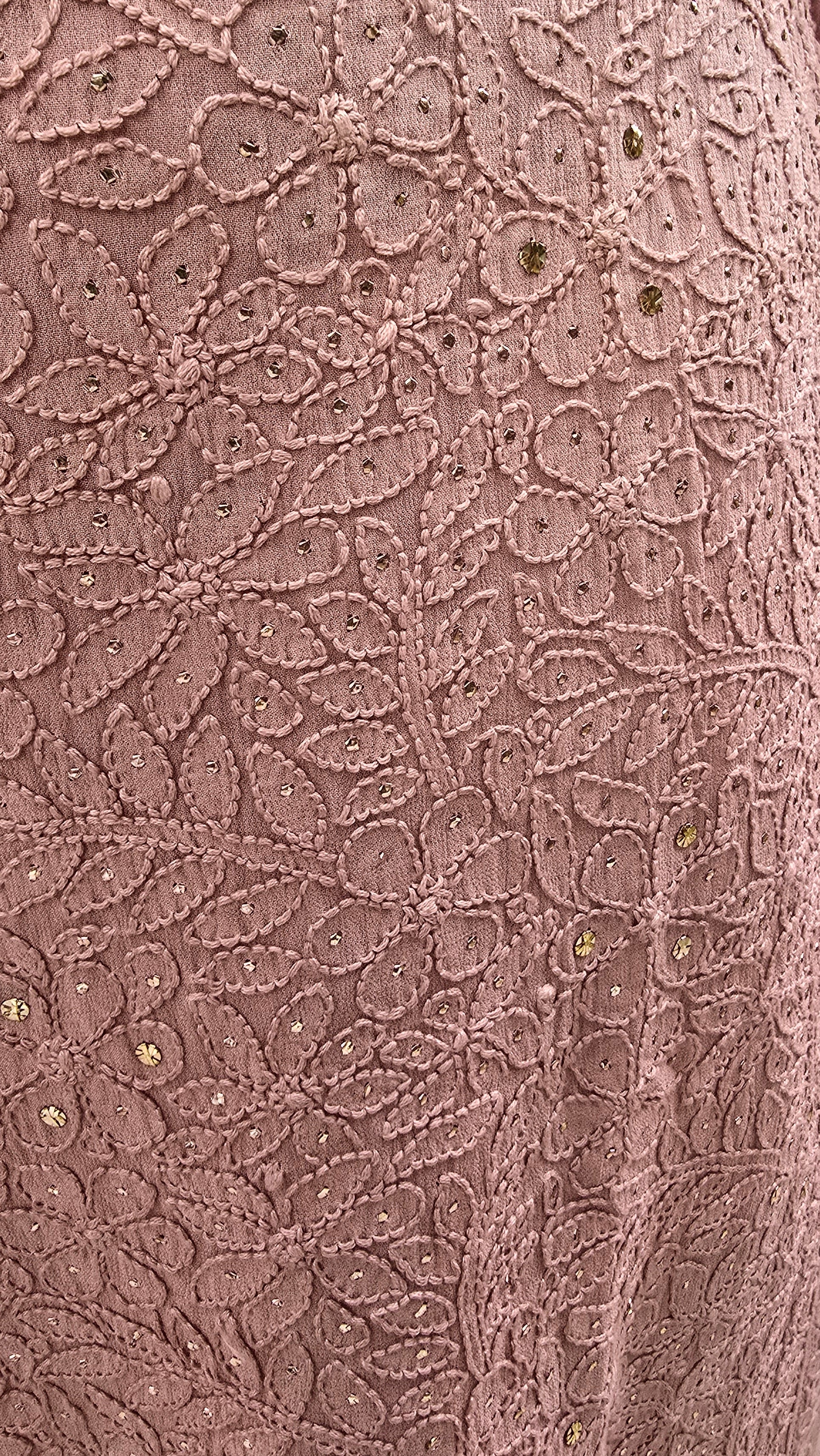 Close-up of floral patterns chikankari with mukesh