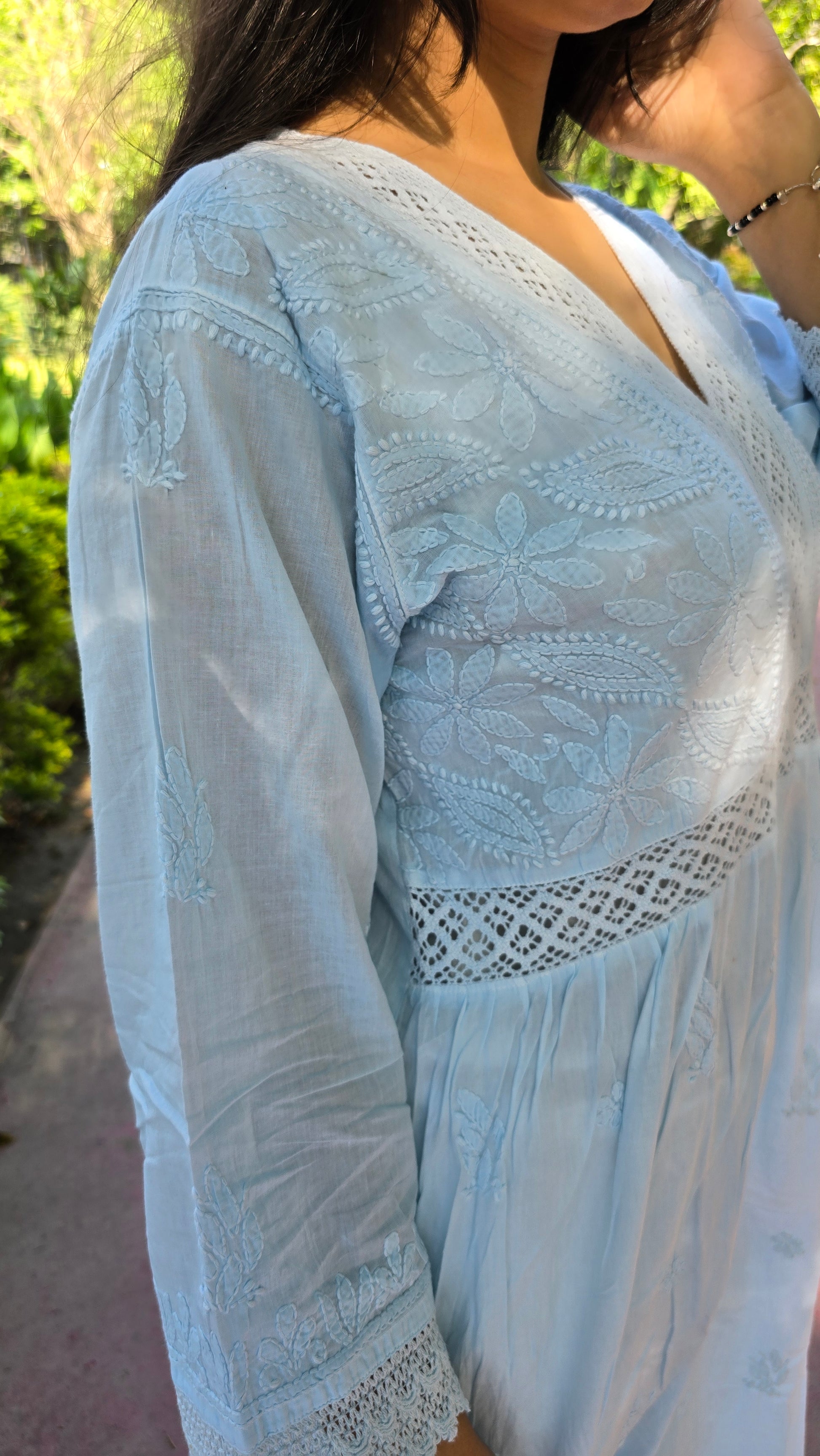 Intricate chikankari shadow work with lase work on neck and sleeves